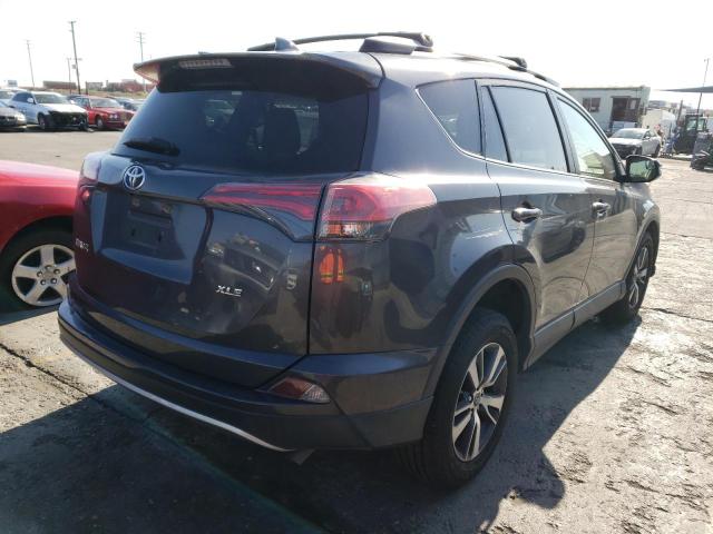 Photo 3 from auction – 2016 TOYOTA RAV4 XLE with VIN JTMWFREV5GJ072396