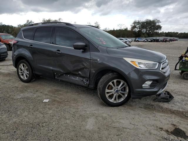 Photo 4 from auction – 2018 FORD ESCAPE SE with VIN 1FMCU0GD0JUB53803