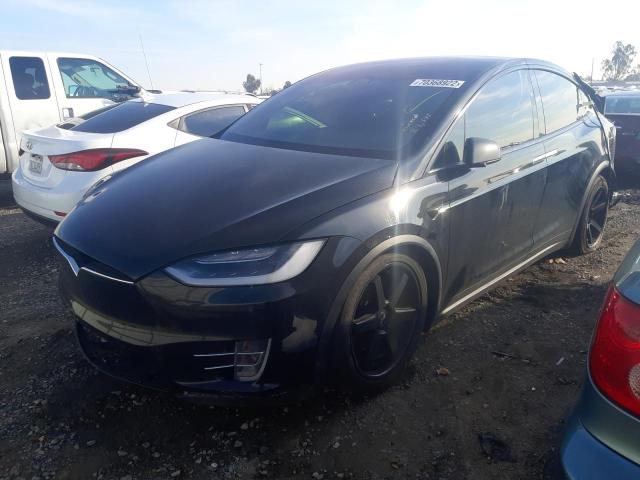 TESLA MODEL X 2017 with VIN 5YJXCDE2XHF050005 - Photo from auction