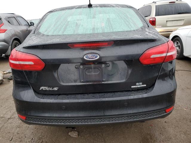 Photo 6 from auction – 2016 FORD FOCUS SE with VIN 1FADP3F20GL405068