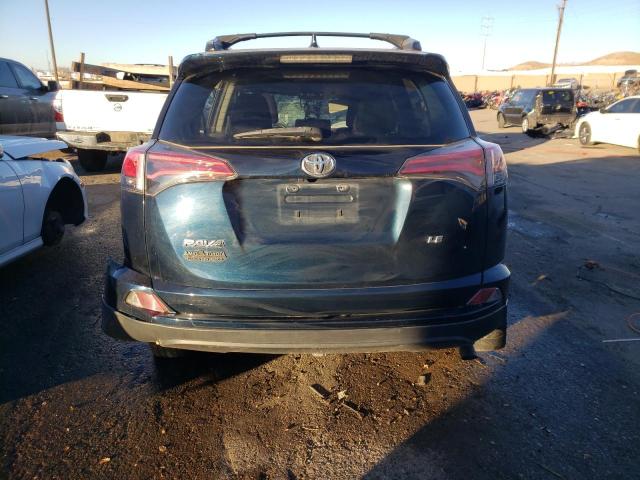 Photo 6 from auction – 2018 TOYOTA RAV4 LE with VIN JTMZFREV3JJ192024