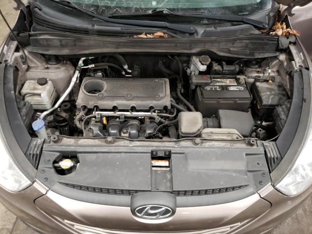 Photo 12 from auction – 2012 HYUNDAI TUCSON GLS with VIN KM8JUCAC8CU397193