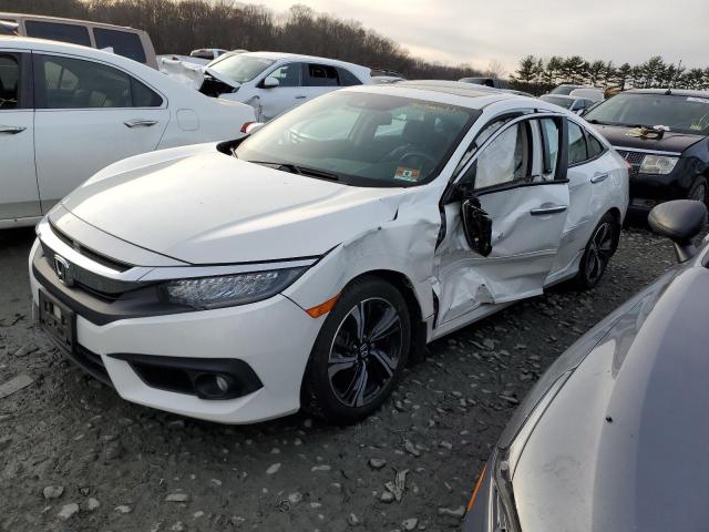 HONDA CIVIC TOUR 2017 with VIN 19XFC1F97HE207680 - Photo from auction