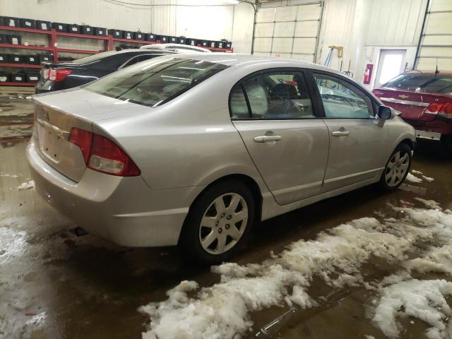 Photo 3 from auction – 2011 HONDA CIVIC LX with VIN 19XFA1F57BE030655