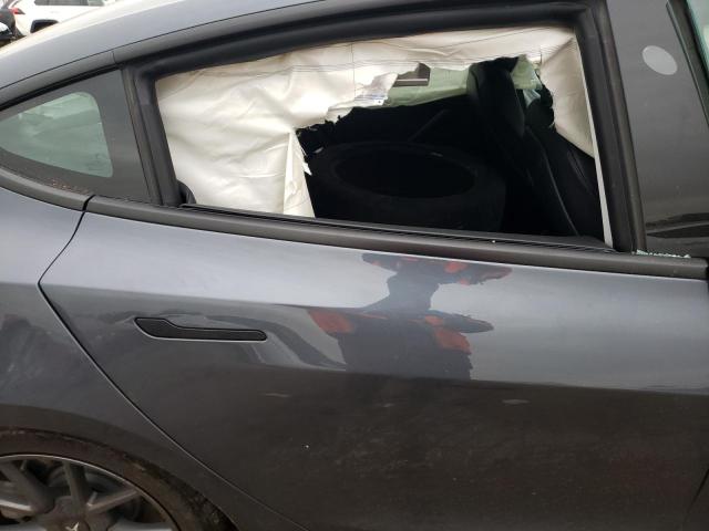 Photo 10 from auction – 2022 TESLA MODEL 3 with VIN 5YJ3E1EB1NF229715
