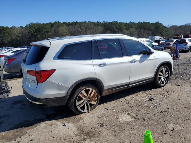 Photo 3 from auction – 2018 HONDA PILOT ELIT with VIN 5FNYF6H05JB056009