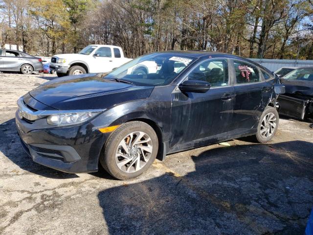 HONDA CIVIC EX 2018 with VIN 19XFC2F79JE027854 - Photo from auction
