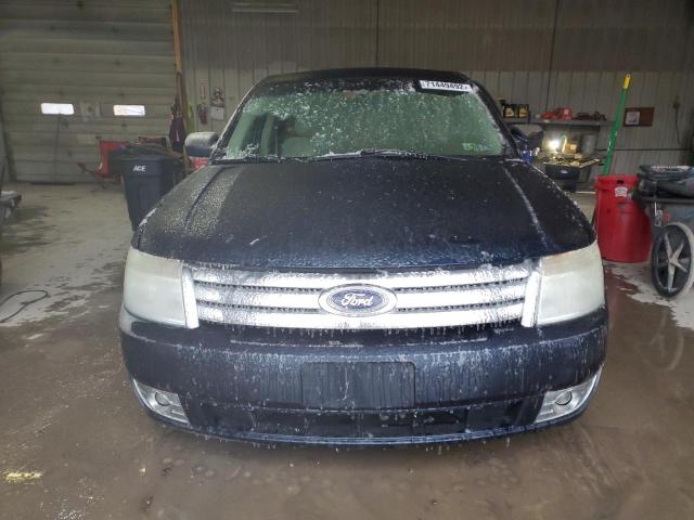 Photo 5 from auction – 2009 FORD TAURUS SE with VIN 1FAHP23W69G113021