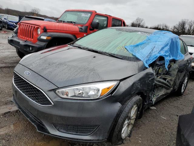 FORD FOCUS SE 2018 with VIN 1FADP3K23JL301235 - Photo from auction