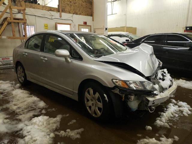 Photo 4 from auction – 2011 HONDA CIVIC LX with VIN 19XFA1F57BE030655