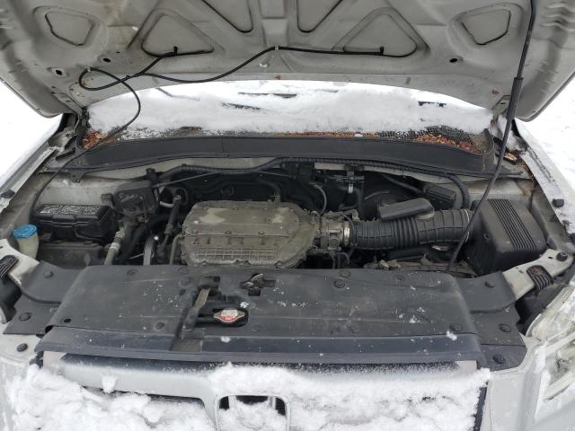 Photo 11 from auction – 2006 HONDA PILOT LX with VIN 2HKYF18146H541665
