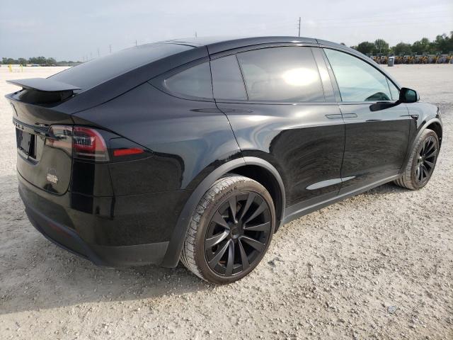 Photo 3 from auction – 2022 TESLA MODEL X with VIN 7SAXCBE65NF354879
