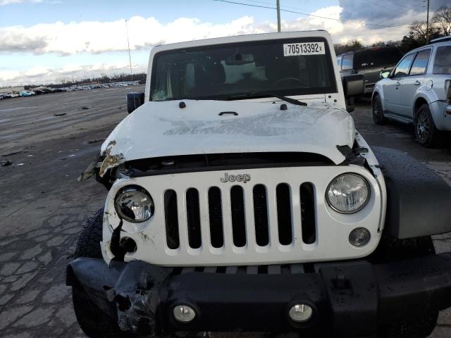 Photo 5 from auction – 2014 JEEP WRANGLER U with VIN 1C4BJWDG8EL304540