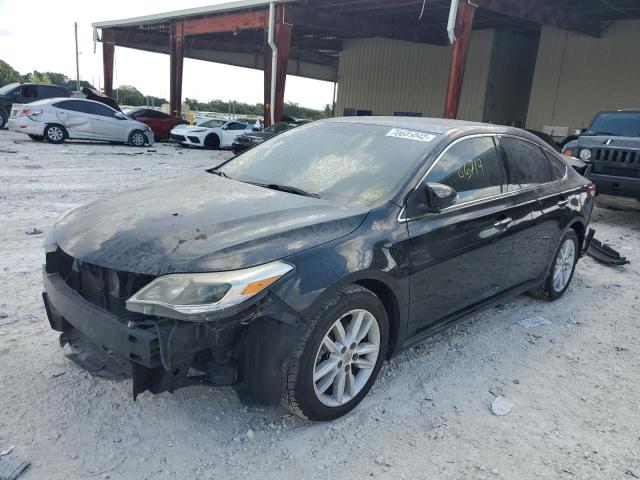 TOYOTA AVALON 2014 with VIN 4T1BK1EB4EU135402 - Photo from auction