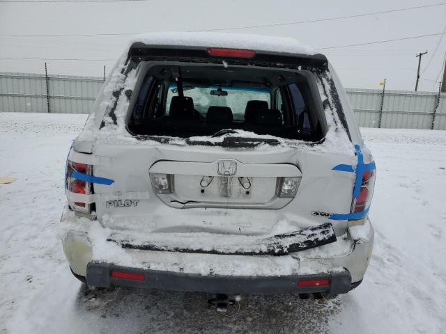 Photo 6 from auction – 2006 HONDA PILOT LX with VIN 2HKYF18146H541665