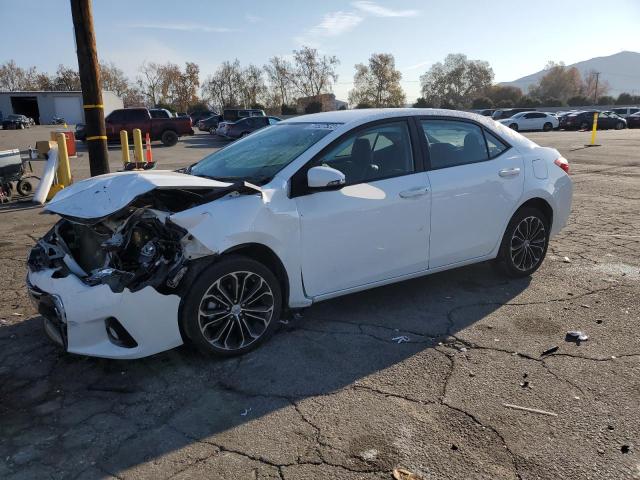 TOYOTA COROLLA L 2015 with VIN 2T1BURHE0FC411902 - Photo from auction