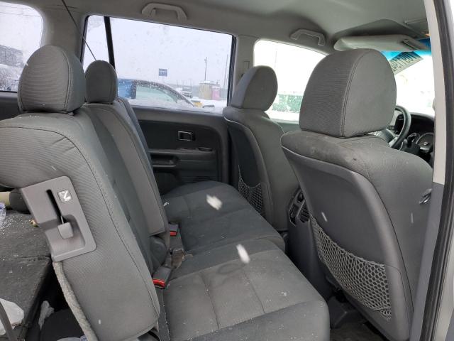 Photo 10 from auction – 2006 HONDA PILOT LX with VIN 2HKYF18146H541665