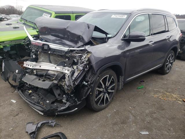HONDA PILOT TOUR 2020 with VIN 5FNYF6H98LB066969 - Photo from auction