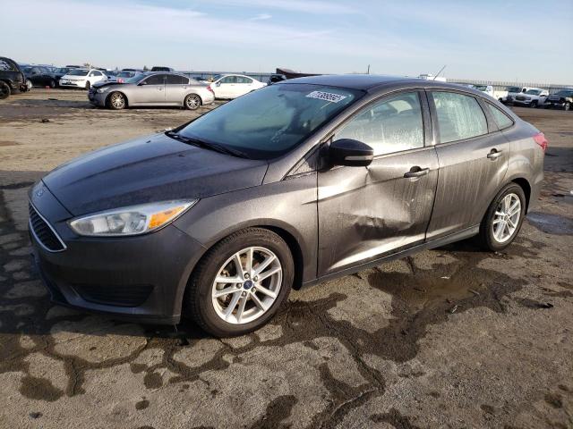 FORD FOCUS SE 2015 with VIN 1FADP3F28FL369970 - Photo from auction
