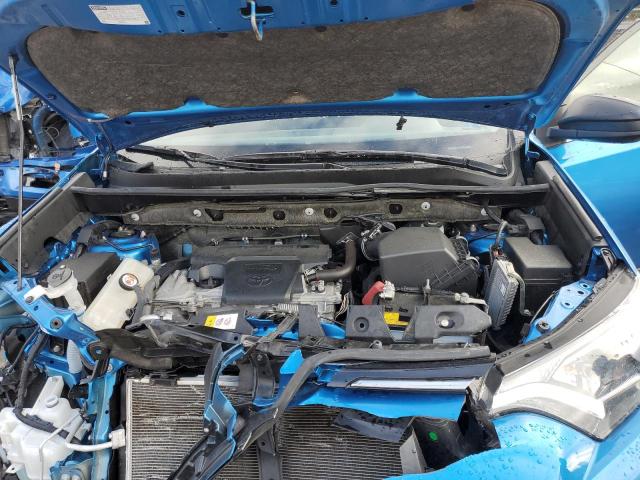 Photo 12 from auction – 2018 TOYOTA RAV4 LE with VIN JTMBFREV6JJ733701
