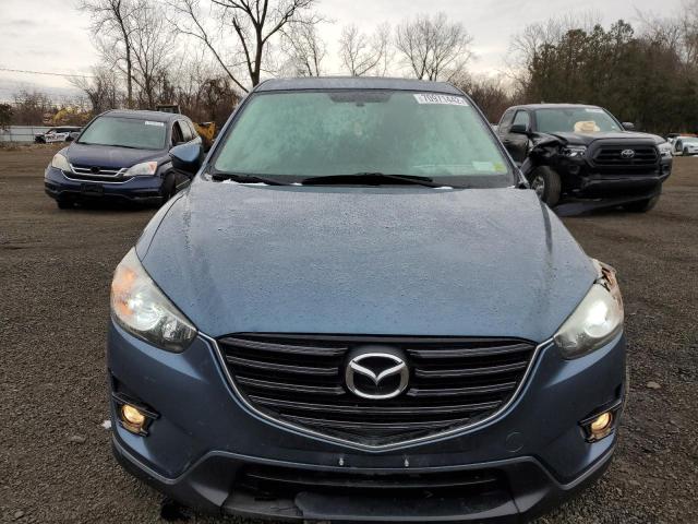 Photo 5 from auction – 2016 MAZDA CX-5 TOURI with VIN JM3KE4CY4G0628762