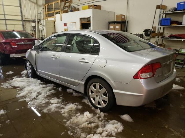 Photo 2 from auction – 2011 HONDA CIVIC LX with VIN 19XFA1F57BE030655