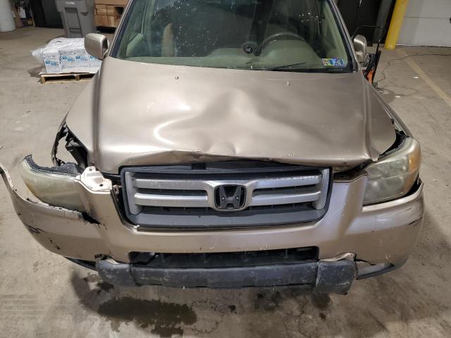 Photo 12 from auction – 2006 HONDA PILOT EX with VIN 2HKYF18486H516083