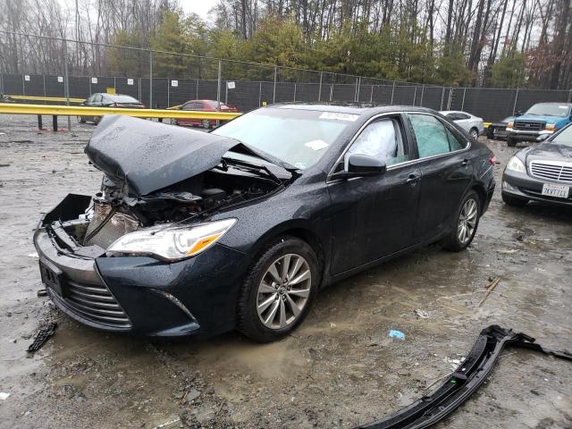 TOYOTA CAMRY LE 2017 with VIN 4T1BF1FK9HU785284 - Photo from auction