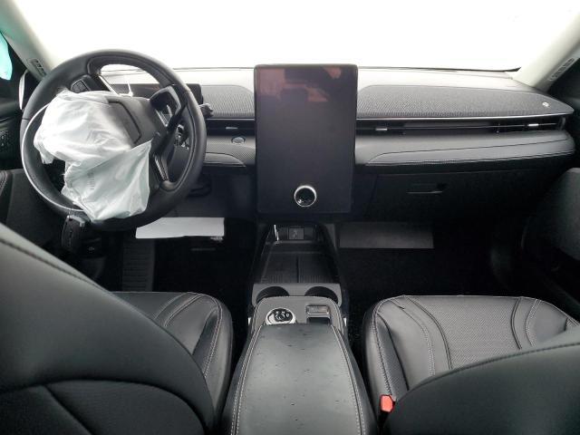 Photo 8 from auction – 2022 FORD MUSTANG MA with VIN 3FMTK3SU0NMA03263