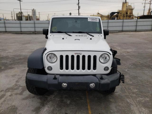 Photo 5 from auction – 2016 JEEP WRANGLER U with VIN 1C4BJWDG1GL115425