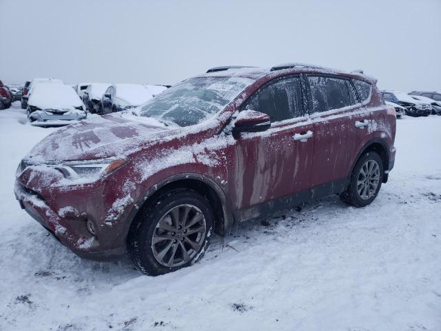 TOYOTA RAV4 LIMIT 2018 with VIN JTMDFREVXJD257945 - Photo from auction