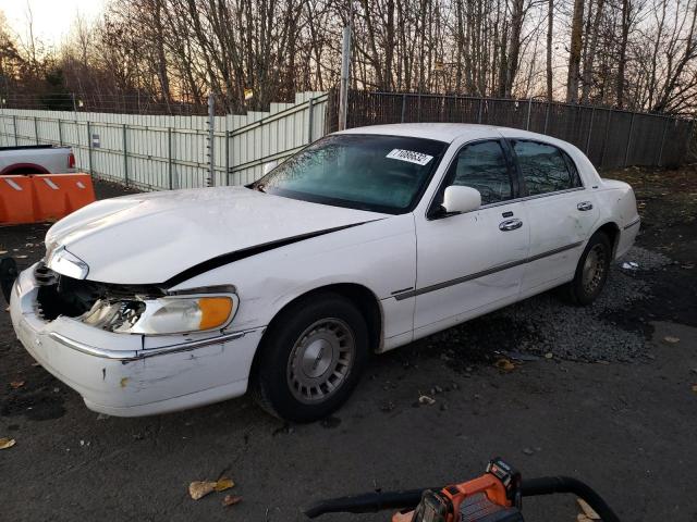 Photo 1 from auction – 1999 LINCOLN TOWN CAR E with VIN 1LNHM81W6XY662830