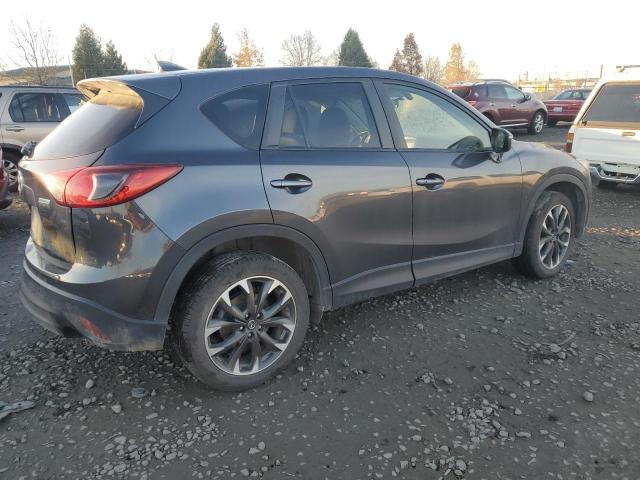 Photo 3 from auction – 2016 MAZDA CX-5 GT with VIN JM3KE4DY5G0899974