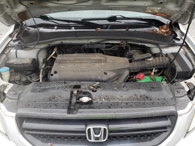 Photo 12 from auction – 2004 HONDA PILOT with VIN 2HKYF18724H592888
