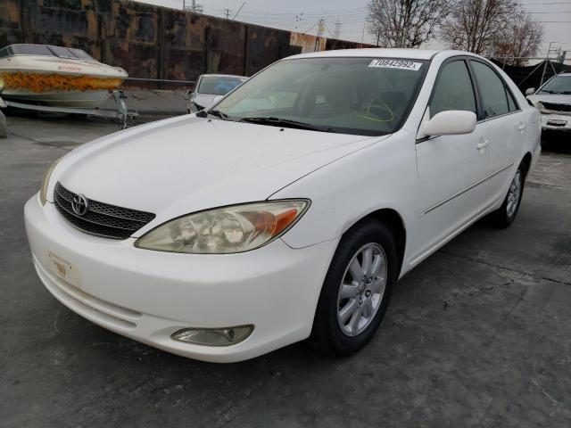 Photo 1 from auction – 2003 TOYOTA CAMRY LE with VIN JTDBE30K730193815