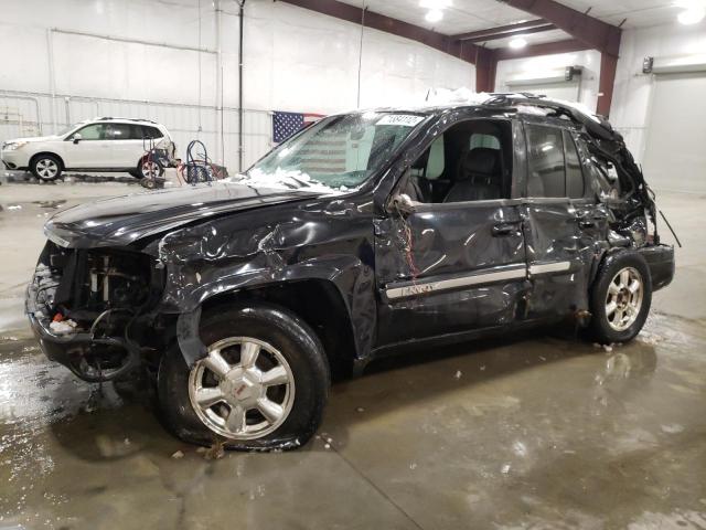 GMC ENVOY 2004 with VIN 1GKDT13SX42146738 - Photo from auction