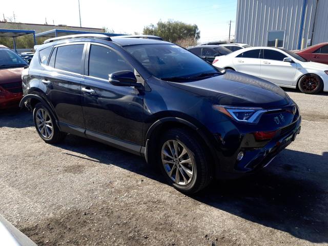 Photo 4 from auction – 2018 TOYOTA RAV4 LIMIT with VIN JTMDFREV7JJ747776