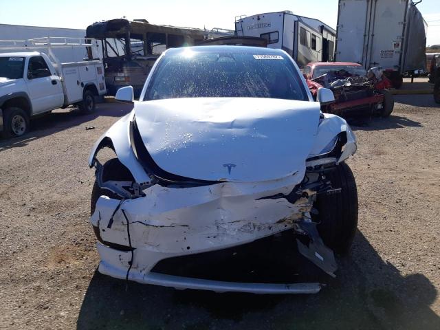 Photo 5 from auction – 2022 TESLA MODEL Y with VIN 7SAYGDEE3NF510140