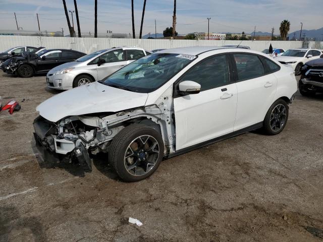 FORD FOCUS SE 2014 with VIN 1FADP3F28EL382426 - Photo from auction