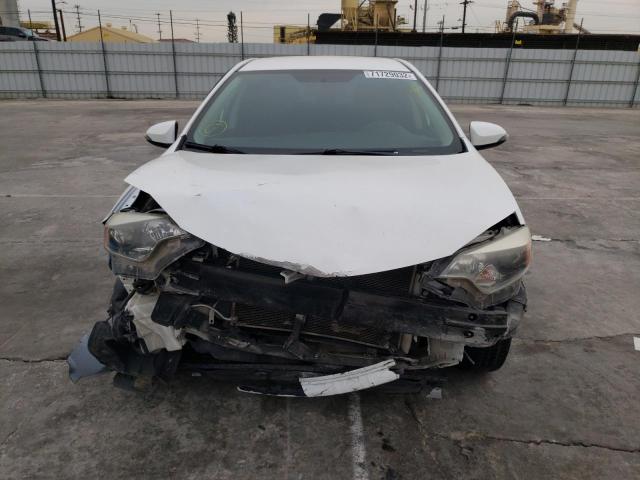 Photo 5 from auction – 2014 TOYOTA COROLLA L with VIN 5YFBURHE9EP095057