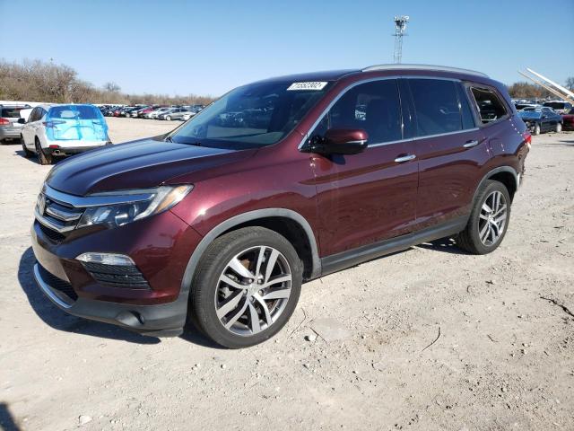 HONDA PILOT TOUR 2016 with VIN 5FNYF5H94GB051336 - Photo from auction