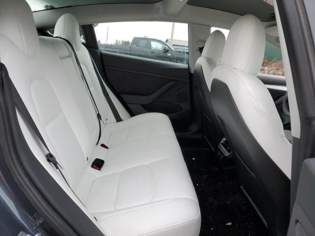 Photo 10 from auction – 2021 TESLA MODEL 3 with VIN 5YJ3E1EA9MF100093