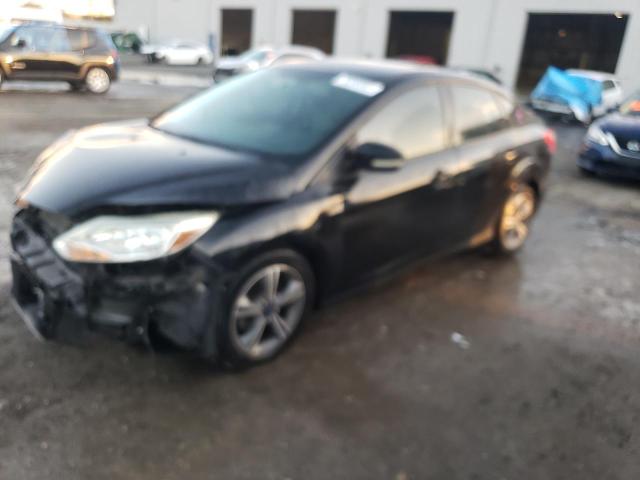 FORD FOCUS SE 2014 with VIN 1FADP3F24EL339136 - Photo from auction