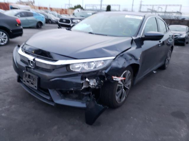 HONDA CIVIC EX 2017 with VIN 2HGFC1F30HH640548 - Photo from auction