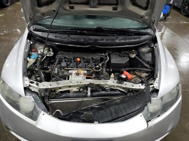 Photo 11 from auction – 2011 HONDA CIVIC LX with VIN 19XFA1F56BE012311