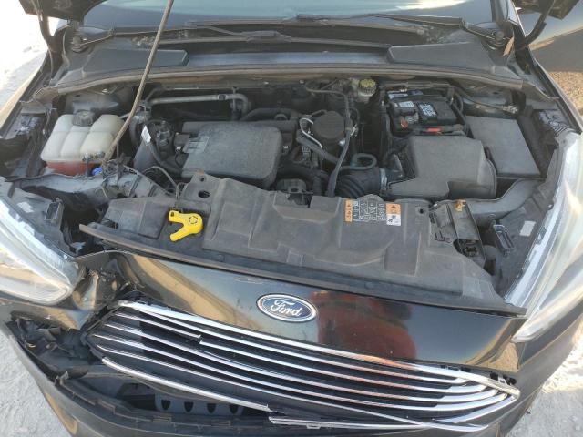 Photo 11 from auction – 2016 FORD FOCUS TITA with VIN 1FADP3J28GL237168