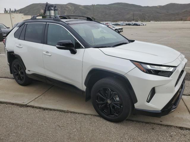 Photo 4 from auction – 2022 TOYOTA RAV4 XSE with VIN 4T3E6RFV4NU076335