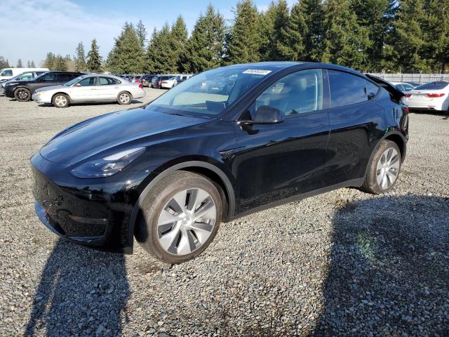 TESLA MODEL Y 2022 with VIN 7SAYGAEE1NF535519 - Photo from auction