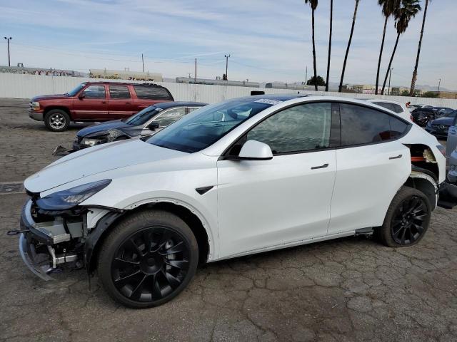 TESLA MODEL Y 2022 with VIN 7SAYGDEE8NF509291 - Photo from auction