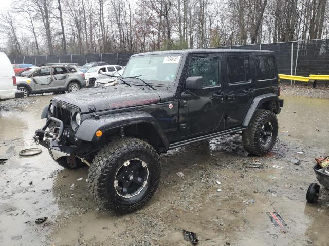 JEEP WRANGLER U 2014 with VIN 1C4HJWFG0EL237665 - Photo from auction